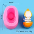 Pink silicone mold for handmade baby shoe craft with size markings and finished product sample - 50-3405 Pink