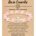 Natuurlijke 8mm rozenkwarts kralenarmband elastisch met wit kruis op cadeaukaart - pink crystal gold beads