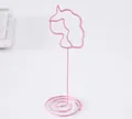 Creative pink metal memo clip featuring a unicorn head design and stable spiral base - Unicorn / Pink