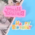 Gedetailleerd overzicht van de Happy Birthday siliconen mal en de kleurrijke taarttopper. - Vette Letterstijl (50-2241-A)