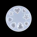 Dettaglio di uno stampo in silicone con motivi a cuore e stella per gioielli in resina. - Stile Cuore e Stella (60-363)