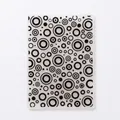 Macro view of fondant embossed mold featuring black concentric circle patterns for cake decoration - Concentric Circle Pattern / 56019 Style
