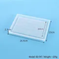 Detail view of large rectangular silicone mold with clear dimension markings on blue background - Puzzle Base Tray Mold (60-547) / S