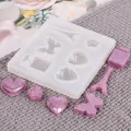 DIY crystal epoxy resin mold with heart, butterfly, and Eiffel tower pendant shapes. - Butterfly Tower Heart Style (60-193) / 60-193 White