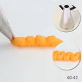 Stainless steel piping nozzle model 40-42 with circular detail showing wavy cream effect - Wave Pattern Piping Tip (40-42) / 40-42