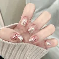 Elegante silber schimmernde Kunstnägel mit süßen roten Schleifenmustern und kleinen Punkten - R829 Vitalitäts-Schmetterling