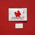 60 ml transparenter PVA-Puzzle-Kleber im Beutel mit weißem Schaber - Kleber und Spatel / Transparent