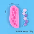 Pink silicone mold featuring bubble ball patterns for DIY fondant and cake decorating - Long Bubble Ball Chain (50-3164-A) / Approx 9.5cmx4cm / Pink