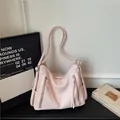 Chic light pink high capacity hobo shoulder bag for women with decorative zipper detail - 29*11*17 / Pink