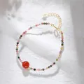 Handmade rainbow natural tourmaline beaded bracelet with red agate and 14K gold plated chain - Red Agate Focal Bead Style