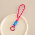 Zweifarbige rosa und blaue geflochtene Telefon-Lanyard mit rundem Metall-Karabiner - Fuchsia