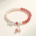 Elegant freshwater pearl and red strawberry crystal bracelet with butterfly charm - Strawberry Quartz Freshwater Pearl Butterfly Style
