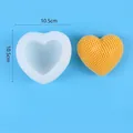 Detail view of heart shaped silicone mold with grid texture and yellow soap sample - 50-3192 (White) / White