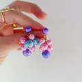 Detailed view of colorful grape cluster pearl earrings with elegant gold accents - Multicolor Grape Cluster Style