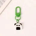 Adorable panda onigiri resin keychain featuring a vibrant green metal lobster clasp - Rice Ball Panda