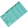 Detail view of the mint green fondant drying board showing circular and rectangular slots - Mint Green
