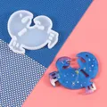 Detailed view of Cancer zodiac silicone resin mold with a finished sparkling blue pendant - Cancer (60-1009)