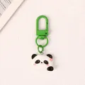 Cute cartoon resin panda keychain pendant with vibrant green metal clip for backpack decor - Flower Panda