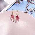 Elegant cicada wing drop earrings featuring pink gradient resin and sparkling rhinestones - Gold Style / Red