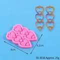 Pink heart earring silicone mold with finished resin jewelry pieces and dimensions - Heart Tassel Style (50-3036-A)