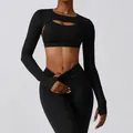 Detail view of black long sleeve yoga shrug with thumb holes and matching sports bra - S / Tops / Premium Black
