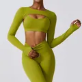 Close-up detail of lime green yoga set featuring long sleeve shrug and sports bra - S / Tops / Matcha Green