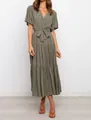 Detailed view of women's bohemian V-neck maxi dress with tiered ruffle hem and tie waist - Gray