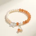 Handmade freshwater pearl bracelet with orange agate beads and silver butterfly charm - Sunstone Freshwater Pearl Butterfly Style