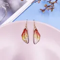 Exquisite cicada wing drop earrings featuring orange yellow gradient and gold foil accents - Gold Foil Style / Orange