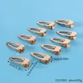 Lot de dix barrettes à cheveux en métal doré pour l'artisanat en résine DIY, 6 cm de long - Accessoire de Barrette en Métal Doré en Forme de Larme (D157001)