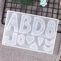 Translucent silicone mold featuring letters and geometric shapes for DIY resin earrings - Alphabet Style (60-424)