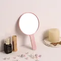 Professional portable round handheld makeup mirror in soft pink finish for vanity use - Round Mirror / Pink