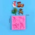 Pink Christmas silicone mold with snowman, reindeer, and bells shapes for DIY baking - Snowman Bell Oak Leaf Reindeer (50-3223-A) / Pink
