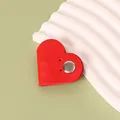 Minimalist red heart-shaped PU leather cable organizer with secure metal snap button closure - Red