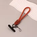 Durable orange nylon phone wrist strap with brown leather accent and black gasket set - Brown