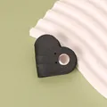 Black heart-shaped PU leather cable organizer with snap button closure for cord management - Black