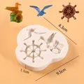 Nautical silicone mold featuring seagull and ship wheel designs for fondant baking - Helm Seagull and Bird Design (50-852-B) / Gray