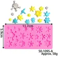 Pink silicone mold for snowflake fondant decorations with size and weight markers - Detailed Snowflake Pattern (50-1095-A) / Pink