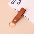 Porte-clés minimaliste en cuir PU marron avec anneau en métal doré de haute qualité pour sacs - Marron