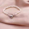 Detail of Baroque freshwater pearl jewelry with silver magnetic heart-shaped clasp. - Bracelet / Freshwater Pearl / Silver