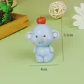 Macro detail view of a cute blue resin elephant cake topper decoration, size 5.5x4cm - Cartoon Resin Elephant