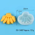 Molde de silicona con forma de plátano para velas DIY y pasteles de fondant, peso 121 g. - 10x8x3.8cm
