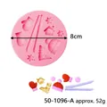 Pink circular Christmas winter themed silicone mold for fondant and cake decorating - Winter Elements Round (50-1096-A)
