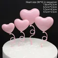 Set mit rosa herzförmigen Ballon-Kuchendekorationen in vier verschiedenen Größen - 4er-Set / Rosa