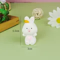 Close-up of cute white resin rabbit figurine for cake decoration measuring 5.5cm by 3cm - Cartoon Resin Rabbit