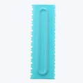 Detailed view of a blue plastic cake cream scraper with dual-patterned edges - Anti-Slip Handle Double-Sided (84004-11)