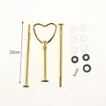Detail view of gold heart-shaped handle and rods for DIY tiered cake stand - Heart Handle Stand Set (Gold) / 02001-71