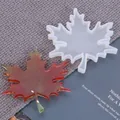 Detailed macro shot of a maple leaf silicone mold with finished red resin coaster - Maple Leaf Style (60-245) / S / White