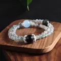Detail of natural stone double-strand bracelet featuring labradorite and blue beads - Grey Moonlight Silver Obsidian Aquamarine Bracelet