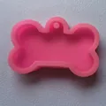 Pink bone-shaped silicone mold for DIY resin keychain pendants and aromatherapy crafts. - Mini Bone Style (50-2219-A)